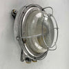 Vintage cast aluminium round bulkhead light with diffusion glass, made in GDR by EOW in the 1970's. Vintage industrial lighting which has been carefully restored