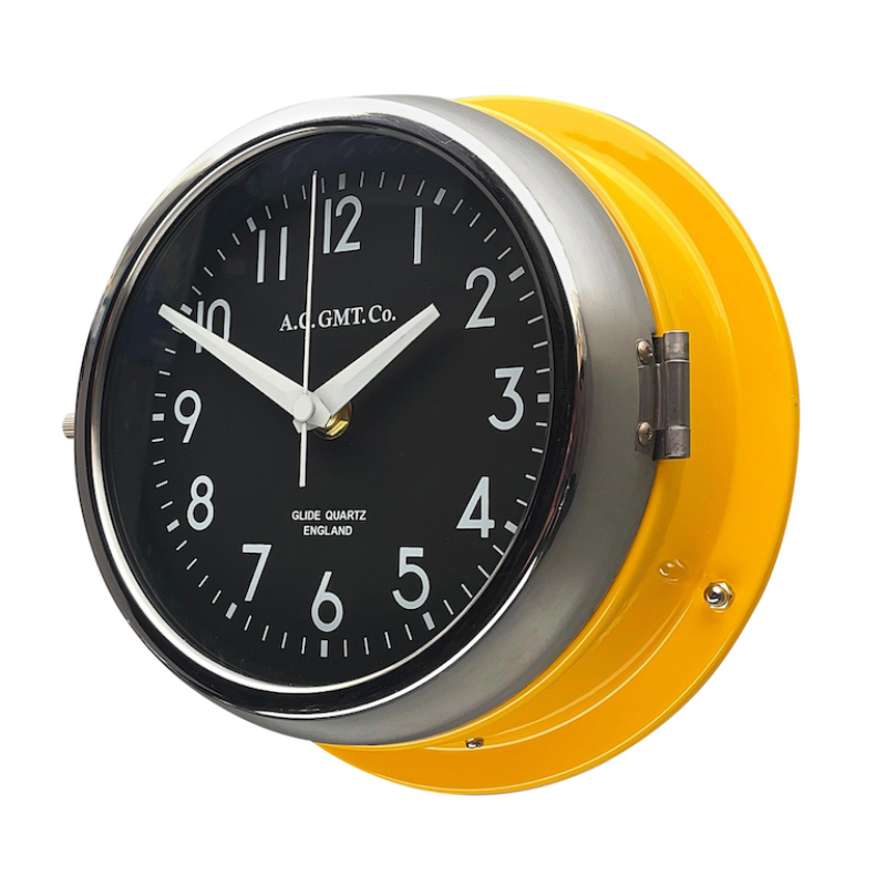 Nautical Yellow wall clock with black face and white digits featuring a quartz silent sweep seconds hand movement meaning no ticking. With a timeless design this wall clock is perfect for any interior. 