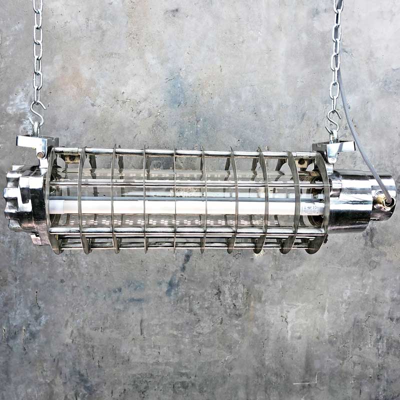 Shop for a 2ft strip light with a cage and LED tubes. A fantastic industrial style feature light refurbished ready for modern interiors. Vintage industrial strip lighting ideal for over a table