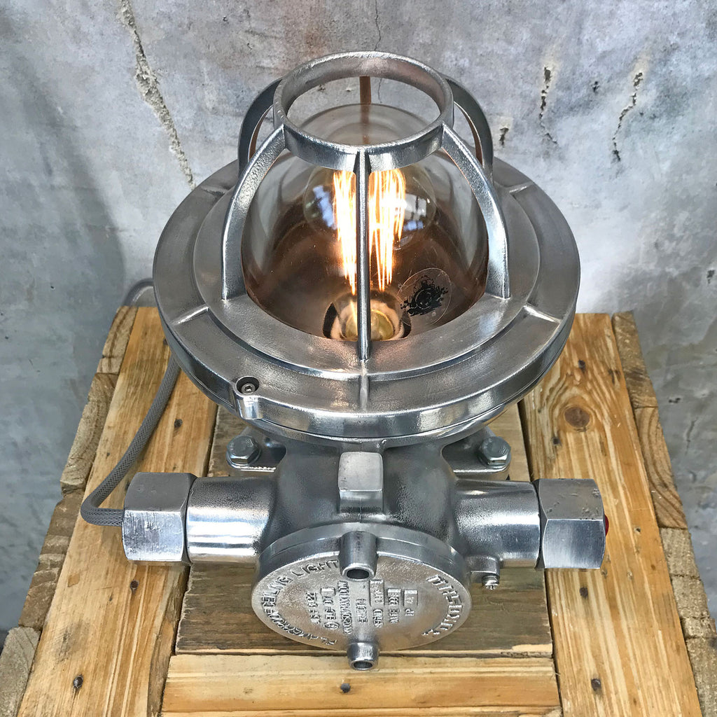 Solid aluminium and tempered glass atex lighting suitable as a desk lamp, table lamp or floor lamp. Highly robust as it was originally an industrial lamp. Loomlight have reclaimed and restored the lamp and it is now ready for modern interiors.
