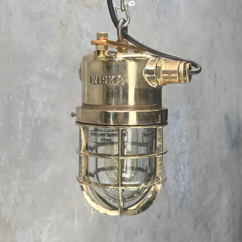 Vintage Industrial Brass explosion proof cage light. Industrial style ceiling pendant with cast brass cage by Wiska