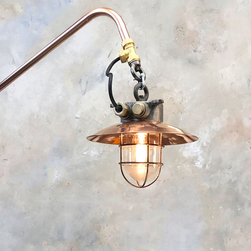 Industrial style swing arm wall light, comprised of copper & iron explosion proof lamp fixed to 22mm copper pipe. 