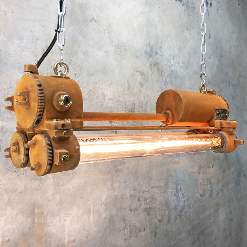Rusted industrial ceiling lighting. This is an reclaimed vintage strip light circa 1970 which has been restored and a rust finish has been applied for a modern rustic makeover. Fitted with Edison LED tubes.