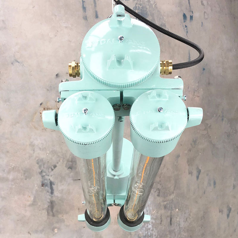 An Edison LED industrial strip light in duck egg green reclaimed from the engine rooms of cargo ships. Originally they were fluorescent fixtures made in the 1970's by South Korean manufacturer, Daeyang. Extensively refurbished with dimmable LED Edison tubes and a modern paint finish ready for contemporary interiors.