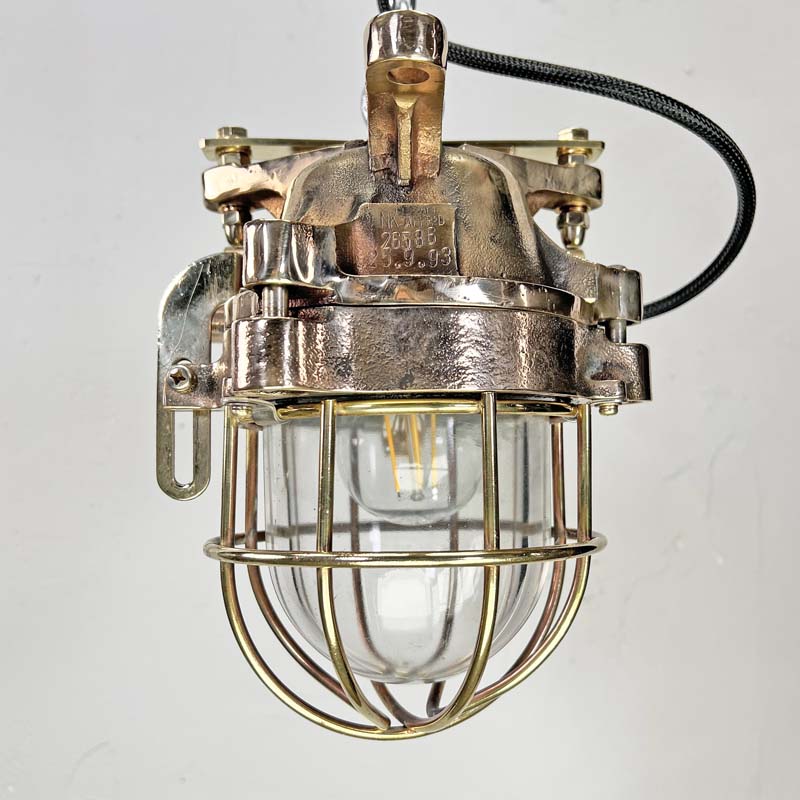 Inject industrial style into your interior with the bronze vintage ceiling light manufactured by Kokosha c1980. Reclaimed from decommissioned cargo ships. Professionally restored by hand in UK by Loomlight to modern lighting standards with braided cable and protective cage.