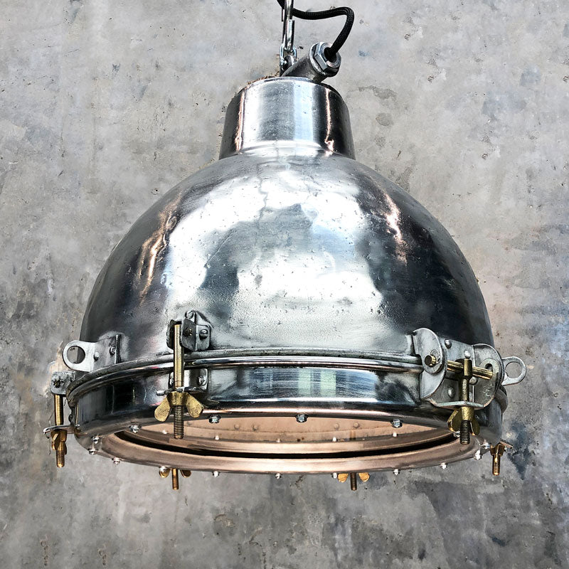 Shop vintage industrial aluminium dome pendant light. These ceiling lights are reclaimed and restored ready for modern interiors compatible with LED filament light bulbs. 