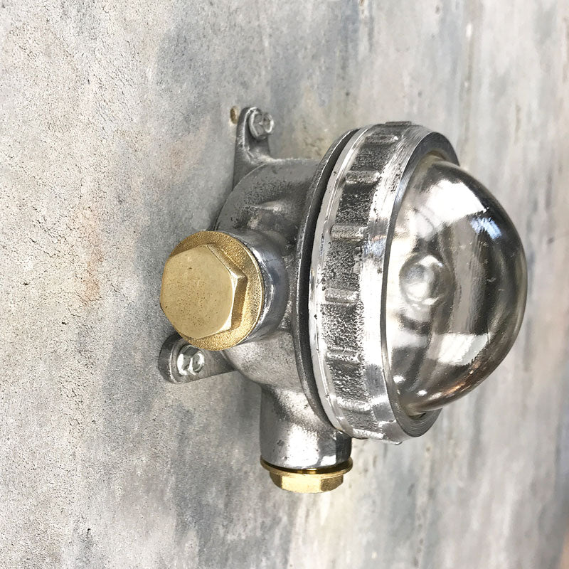 vintage cast aluminium industrial spot light for indoors or outdoor use. Industrial style circular wall light fixture for small spaces. Reclaimed, restored and ready to repurpose.