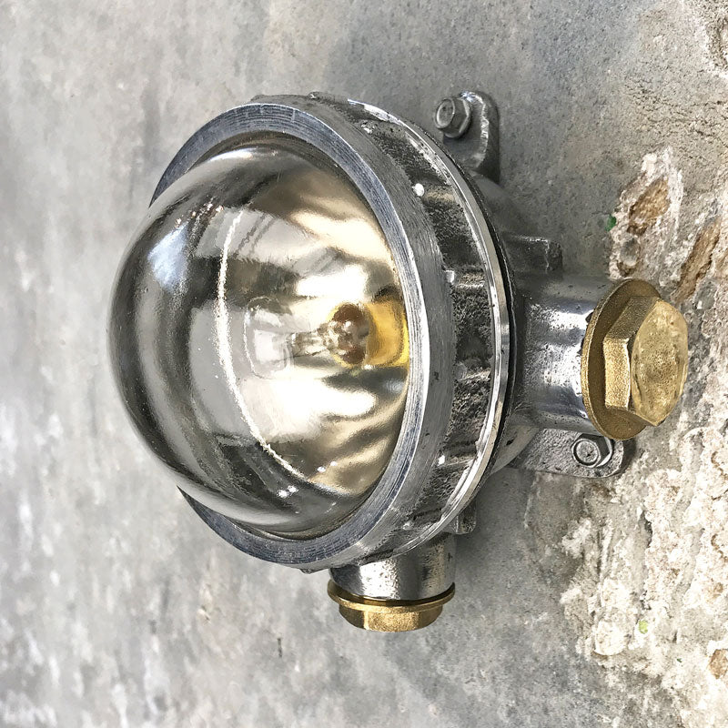 vintage cast aluminium industrial spot light for indoors or outdoor use. Industrial style circular wall light fixture for small spaces. Reclaimed, restored and ready to repurpose.