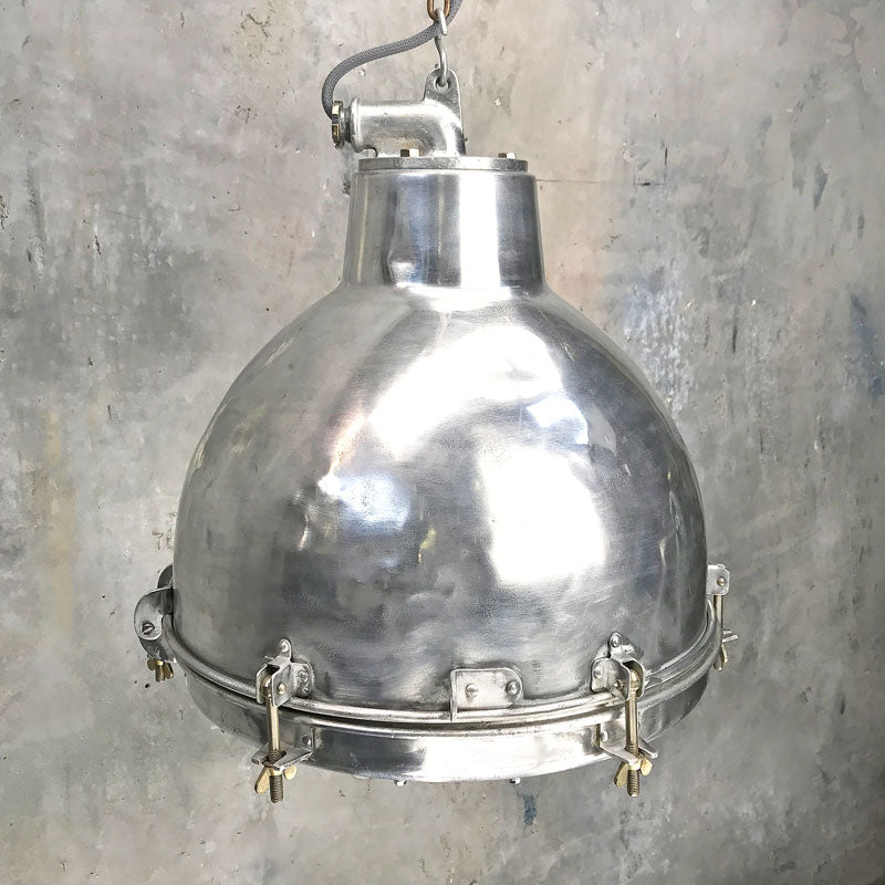 Shop for aluminium industrial dome ceiling light, a vintage pendant light reclaimed and restored compatible with LED filament light bulbs. Ready for modern interiors. 