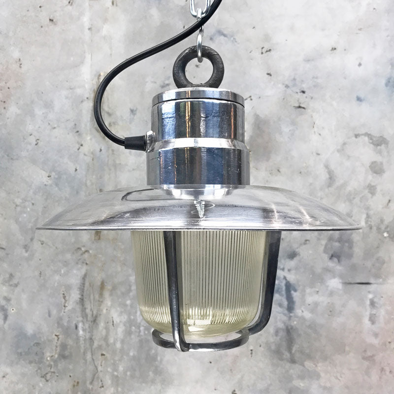 vintage industrial aluminium marine pendant light with a fresnel glass cover which diffuses the illumination