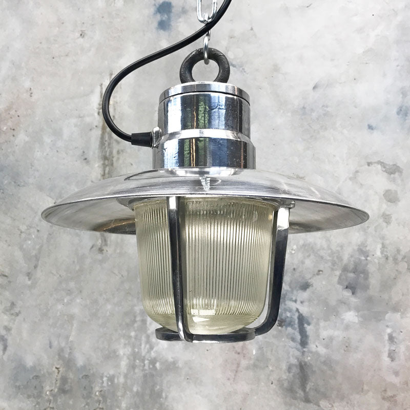 vintage industrial aluminium marine pendant light with a fresnel glass cover which diffuses the illumination