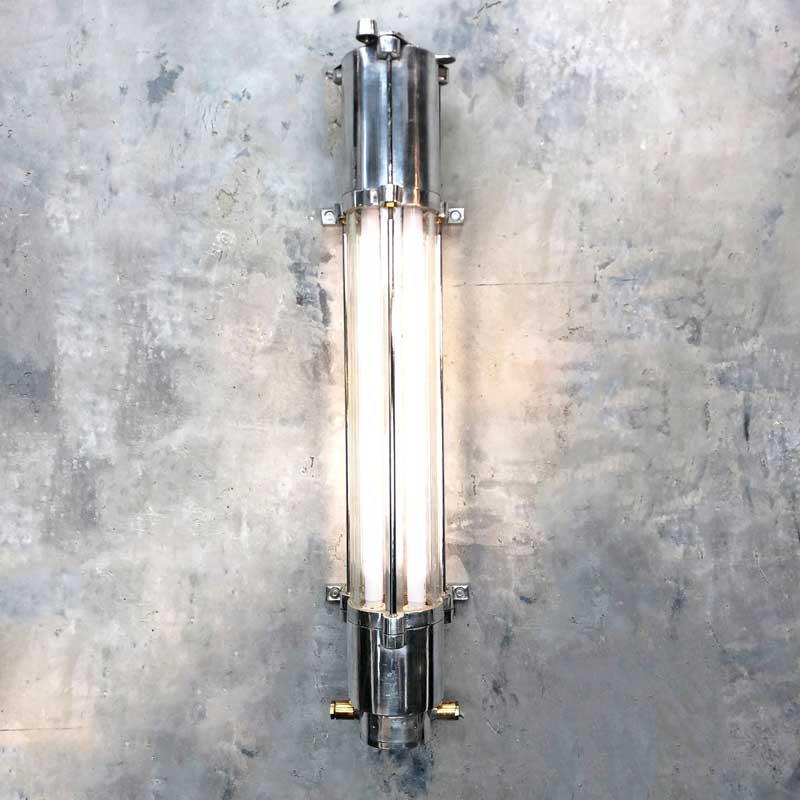Browse our industrial strip lighting collection for this aluminium flameproof strip light for the wall. Reclaimed and restored by Loomlight who have fitted it with T8 LED tubes. This wall mounted tube light is 2ft in length