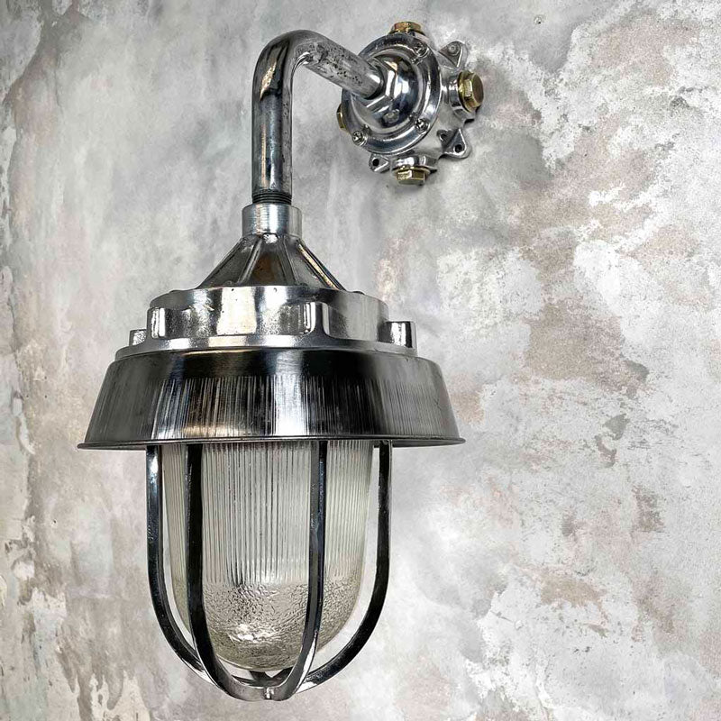 A large outdoor wall light in aluminium and a prismatic glass dome. Perfect for a grand entrance or front door. This vintage  outdoor lighting has been restored for modern use