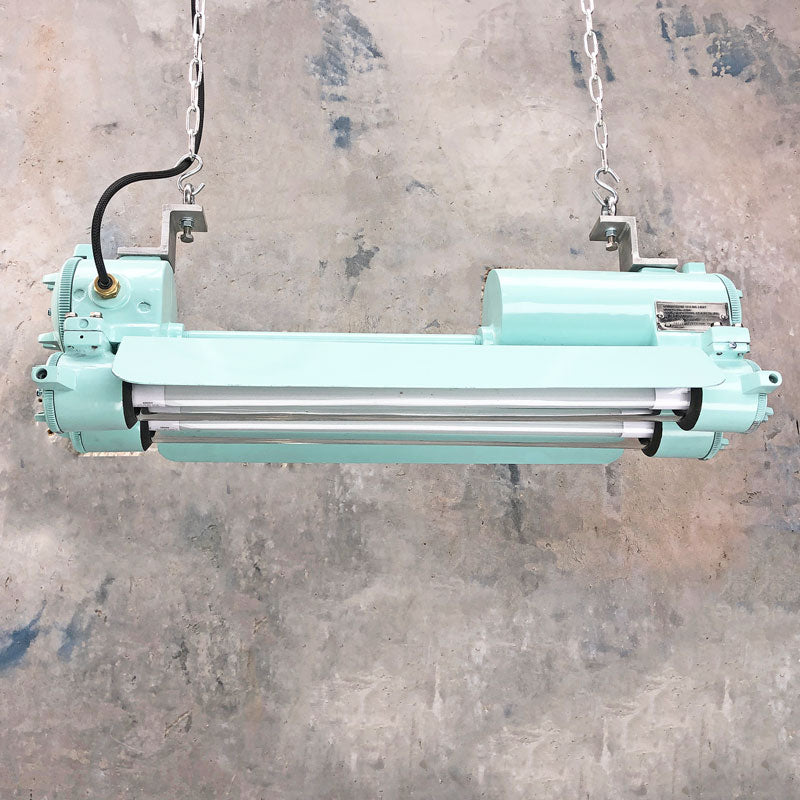 Our original industrial flameproof striplight is professionally refurbished. Fitted with LED T8 tubes and refinished with marine green paint, these retro light fixtures have been transformed into an industrial feature ceiling light perfect for modern interiors.