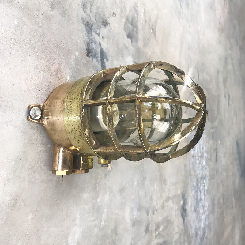 Cage wall light in brass & bronze reclaimed from industrial settings and restored suitable for outdoor use. Also great for modern interiors where you want original industrial features. 