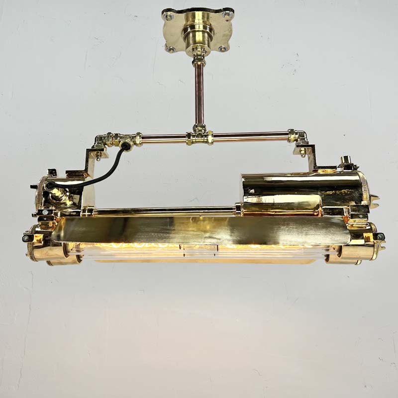 Shop our vintage brass industrial strip light restored with Edison LED tubes and given a modern brass finish. Unique industrial style feature light for ceiling.
