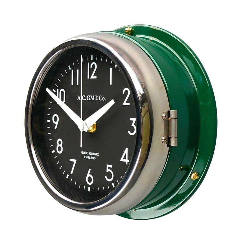 A 20cm diameter green wall clock. This classic wall clock design has been reclaimed from nautical environments and given a modern refurbishment. Featuring a silent sweep seconds hand movement, making this a silent wall  clock.
