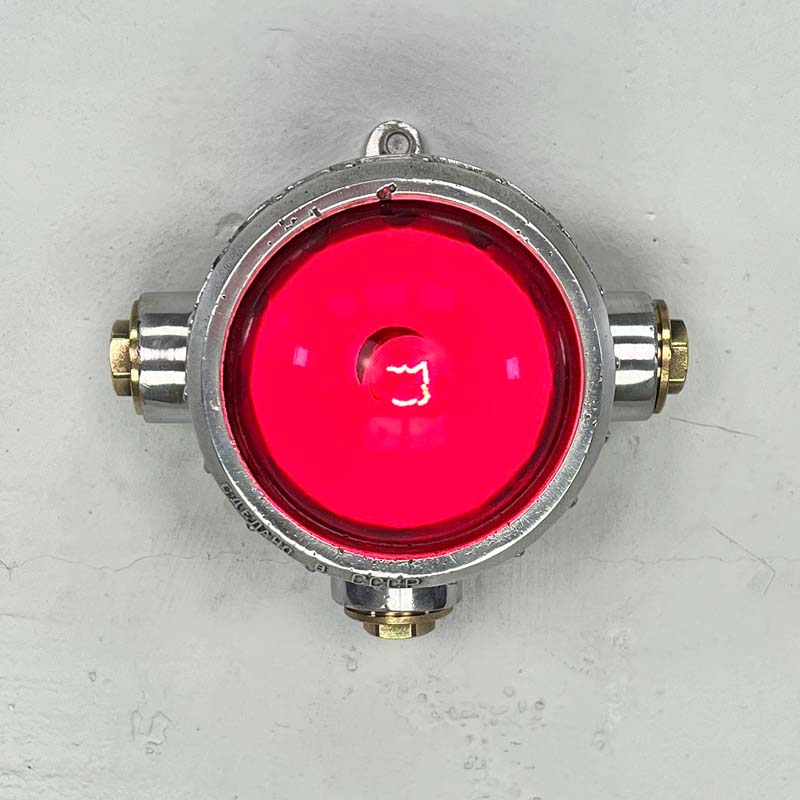 A reclaimed red industrial spotlight for wall or ceiling lighting. Small but robust these quirky lamps will add authentic industrial character to any interior. They can be used with conduit piping where surface mounted electrical cables are required.