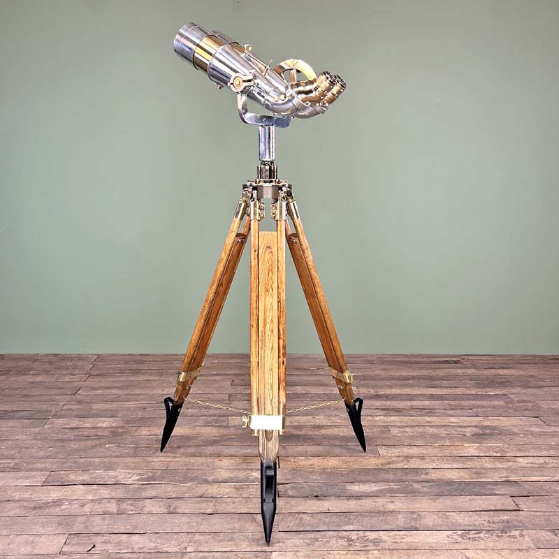 Shop for a refurbished set of antique binoculars paired with a German tripod with brass fittings and hard wood construction. Nikko 15x80 WWII military binoculars originally used for land, sea and air observation.
