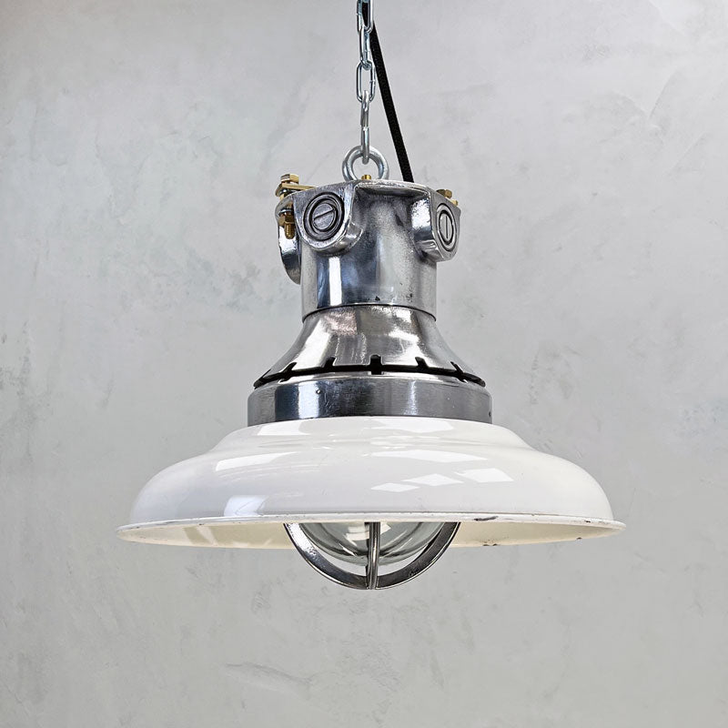 Shop the white pendant light with enamel finish. Vintage industrial pendant lighting restored professionally with LED light bulbs. Worldwide shipping available.