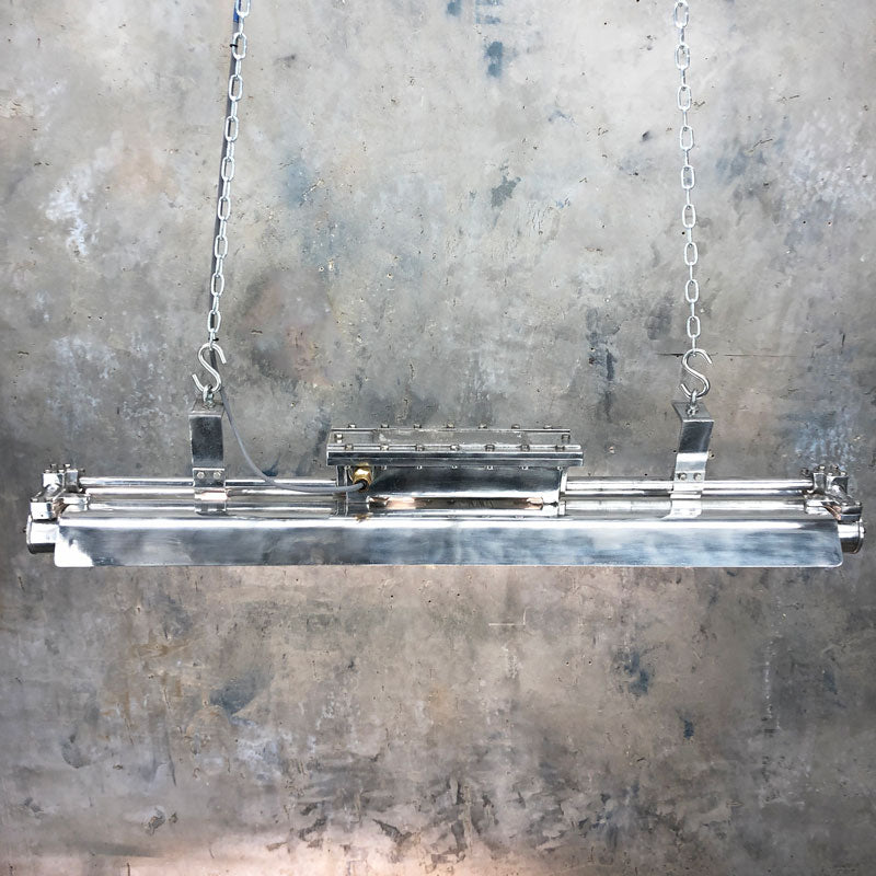 A vintage industrial aluminium striplight with 4ft aluminium flameproof LED tubes manufactured by Crouse Hinds, USA. Refurbished ready to hang industrial style ceiling lighting.