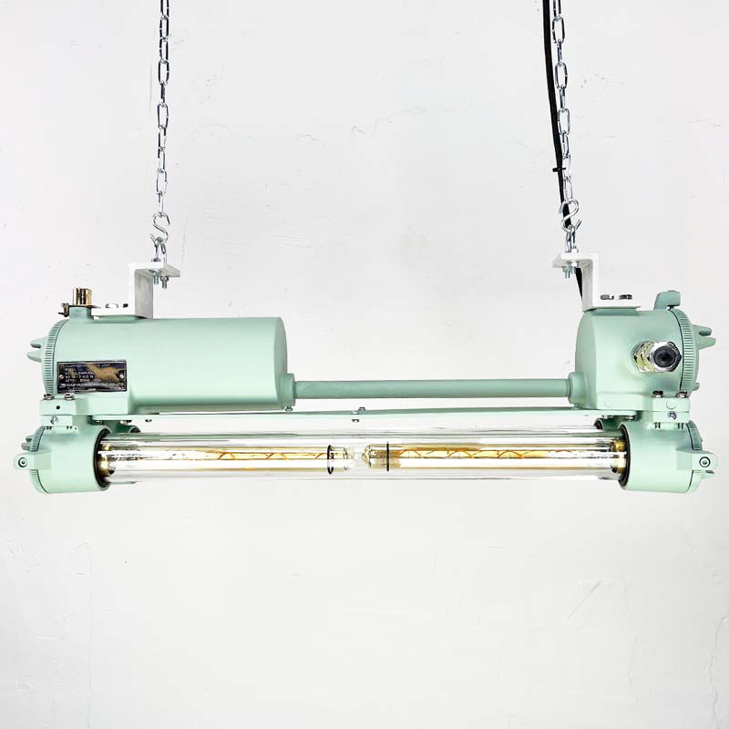 Vintage industrial strip light in matte duck egg green fitted with dimmable Edison LED tubes, reclaimed from the engine rooms of cargo ships. Made in the 1970's by South Korean manufacturer, Daeyang. Extensively refurbished with dimmable LED Edison tubes and a matte paint finish. These ceiling lights are ready to install in contemporary interiors. 