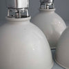 a vintage industrial white pendant light by Thorlux with a sturdy aluminium housing and white enamel dome shade at 460mm diameter. 