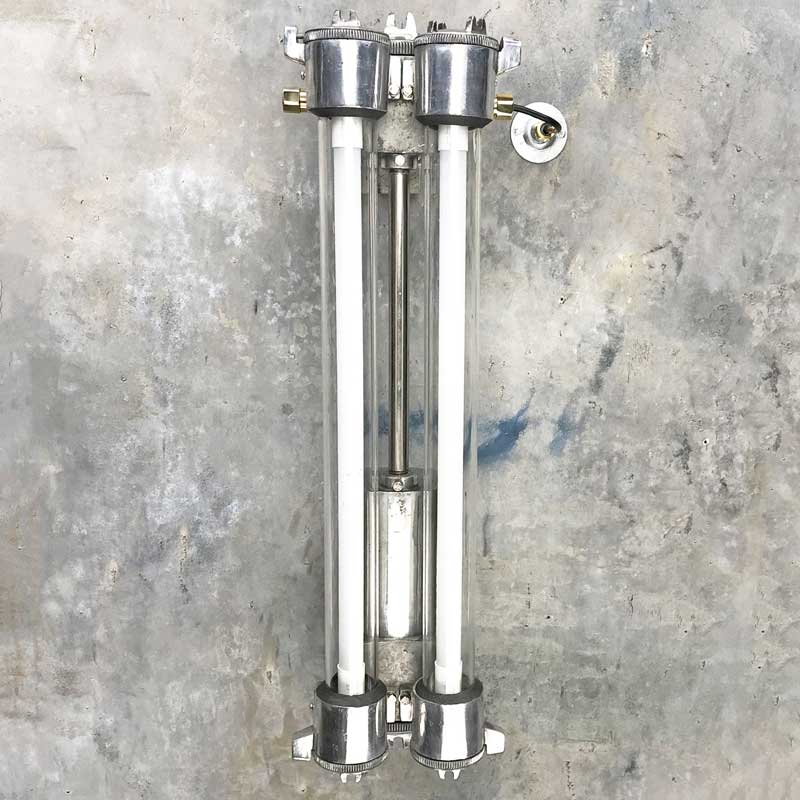 a twin T8 LED flameproof retro striplight reclaimed from industrial environments. Originally a fluorescent striplight but now modified with LED tubes. Our industrial strip lighting collection has a range of wall or ceiling mounted fixtures. 