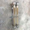 A refurbished industrial flameproof vintage striplight for wall mounting in satin grey. Fitted with Edison LED tubes