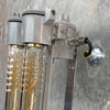 A refurbished industrial flameproof vintage striplight for wall mounting in satin grey. Fitted with Edison LED tubes