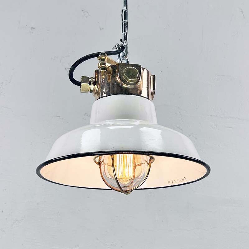 shop our vintage pendant light which comprises a white vitreous enamel shade and an explosion proof bronze cage lamp. Ideal as vintage kitchen lighting as they are fully restored and rewired compatible with LED light bulbs.