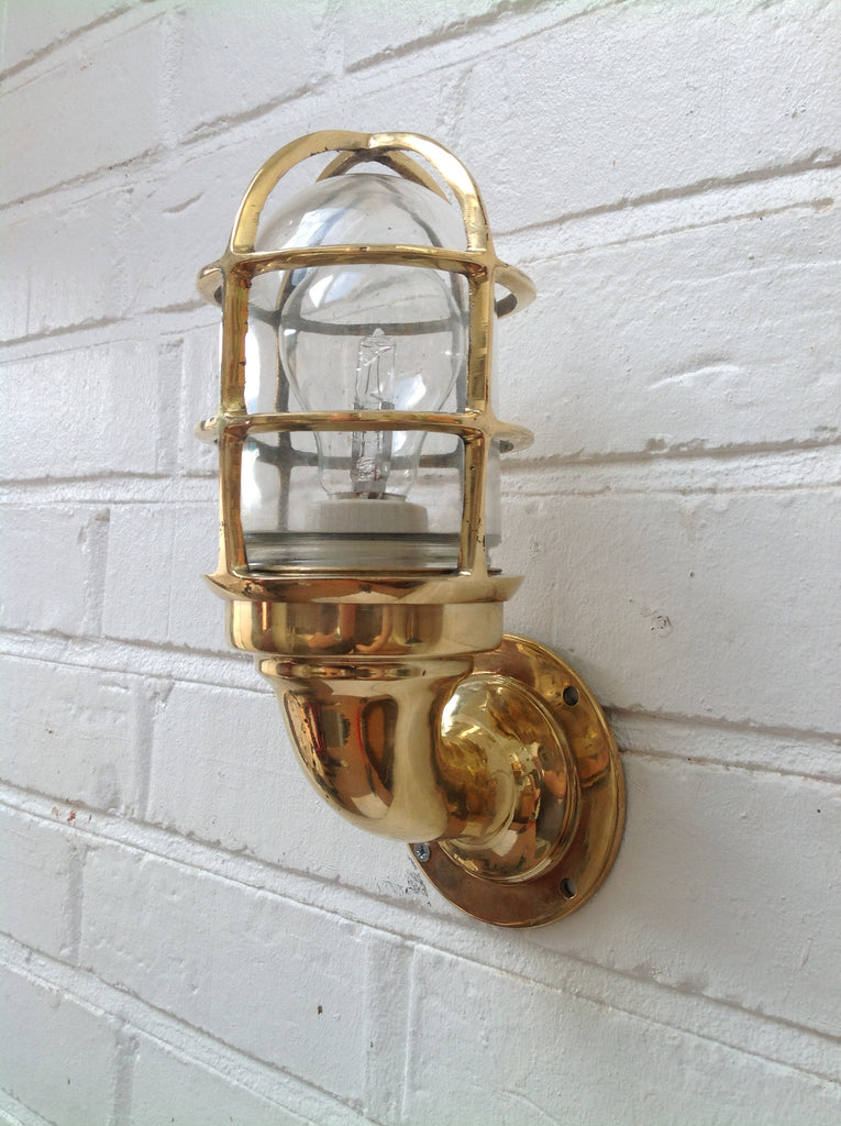 Reclaimed retro industrial style brass cage lighting for the wall
