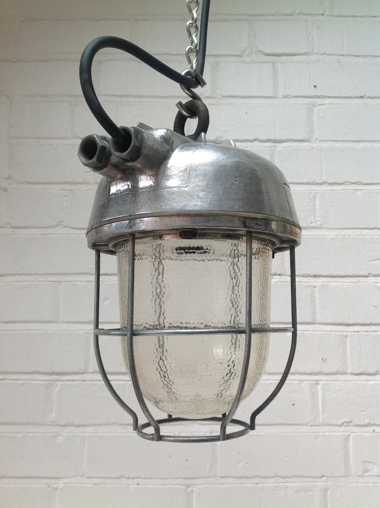 A vintage marine aluminium cage light ceiling pendant.  