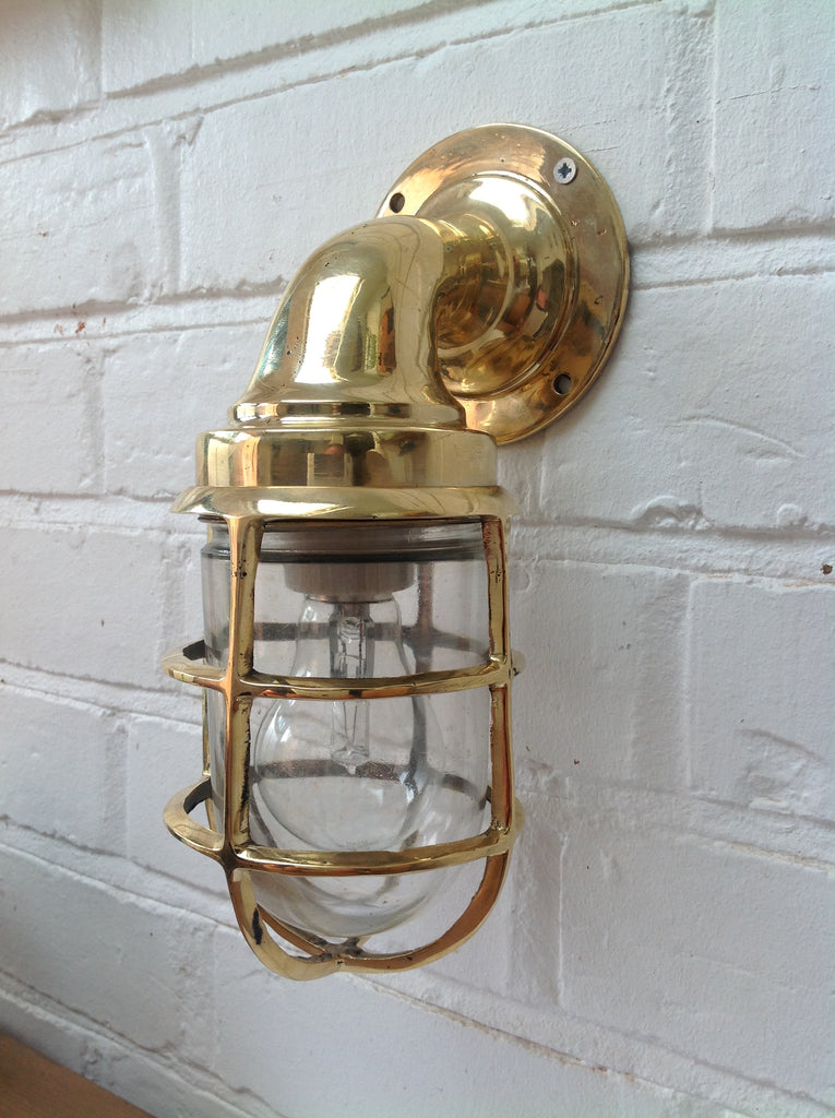 Reclaimed retro industrial style brass cage lighting for the wall