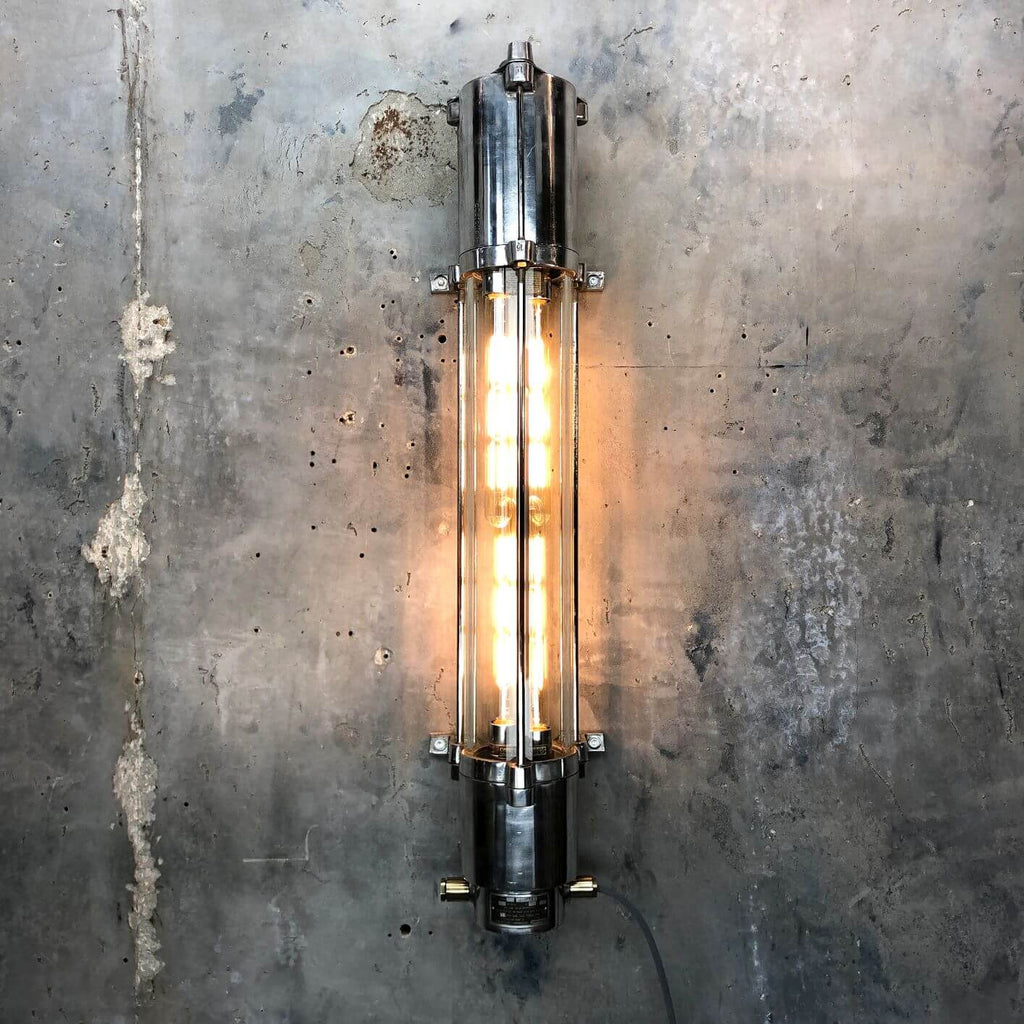 a vintage industrial style aluminium wall mounted flameproof strip light with Edison LED tubes.