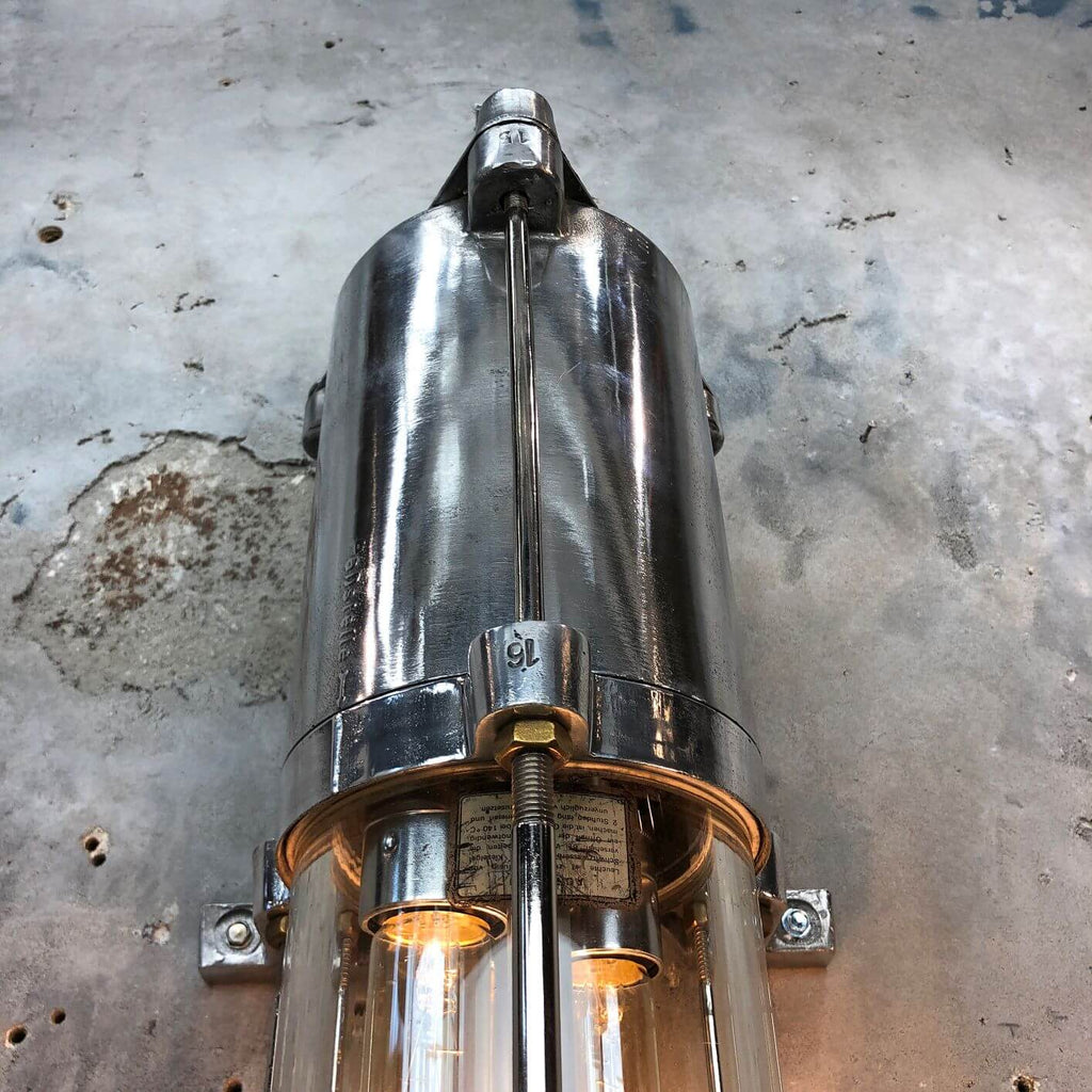 a vintage industrial style aluminium wall mounted flameproof strip light with Edison LED tubes.