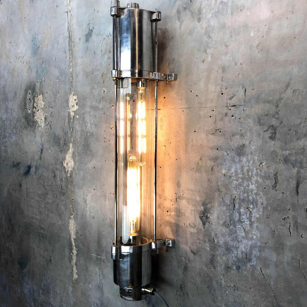 a vintage industrial style aluminium wall mounted flameproof strip light with Edison LED tubes.