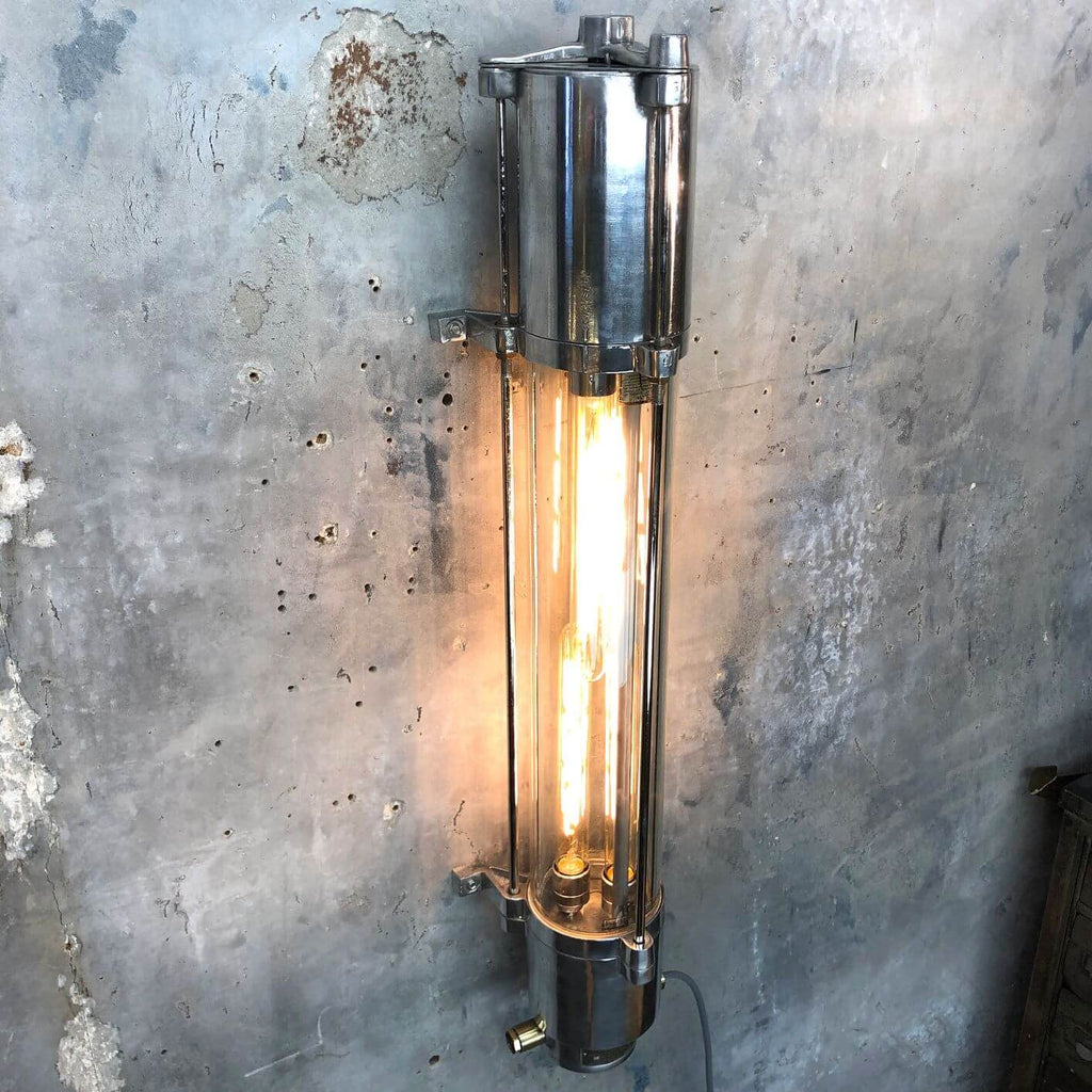 a vintage industrial style aluminium wall mounted flameproof strip light with Edison LED tubes.