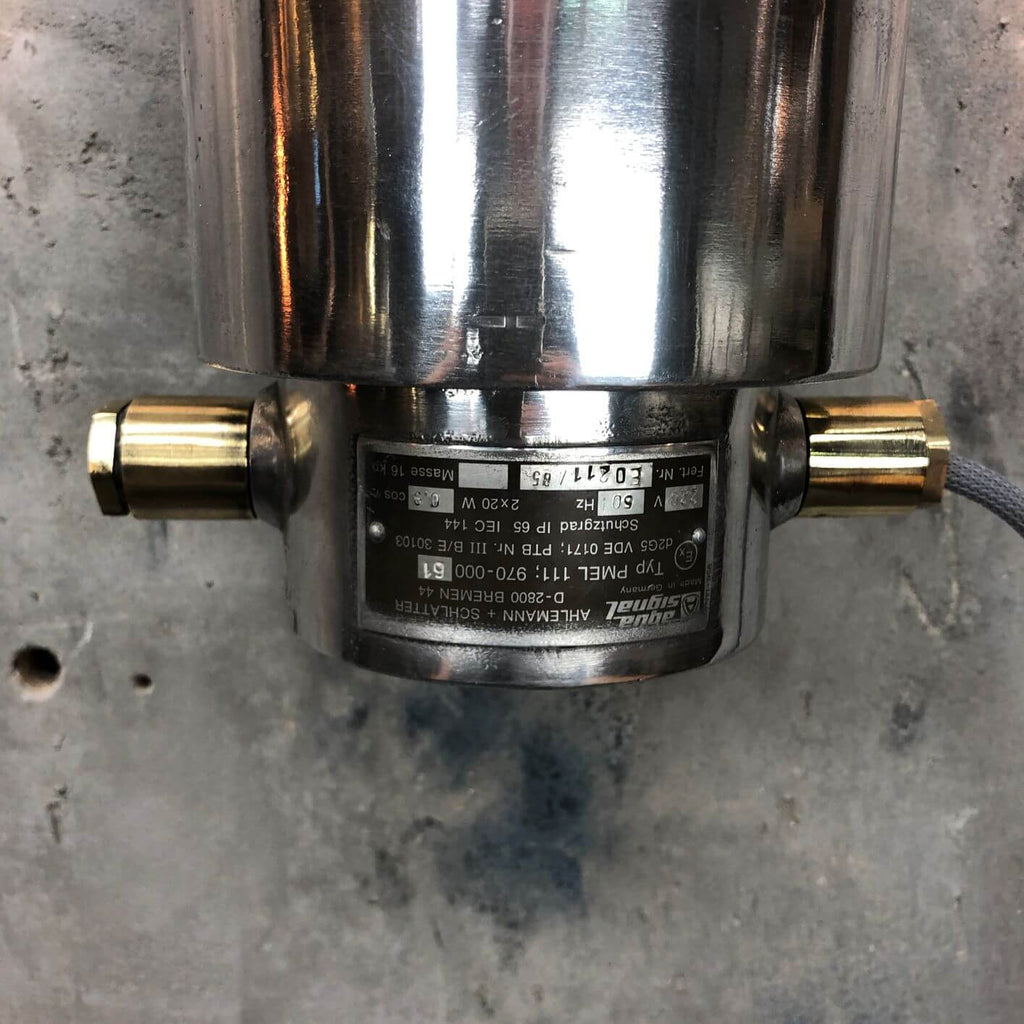 a vintage industrial style aluminium wall mounted flameproof strip light with Edison LED tubes.