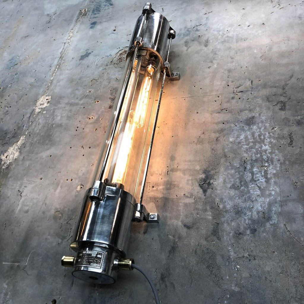 a vintage industrial style aluminium wall mounted flameproof strip light with Edison LED tubes.