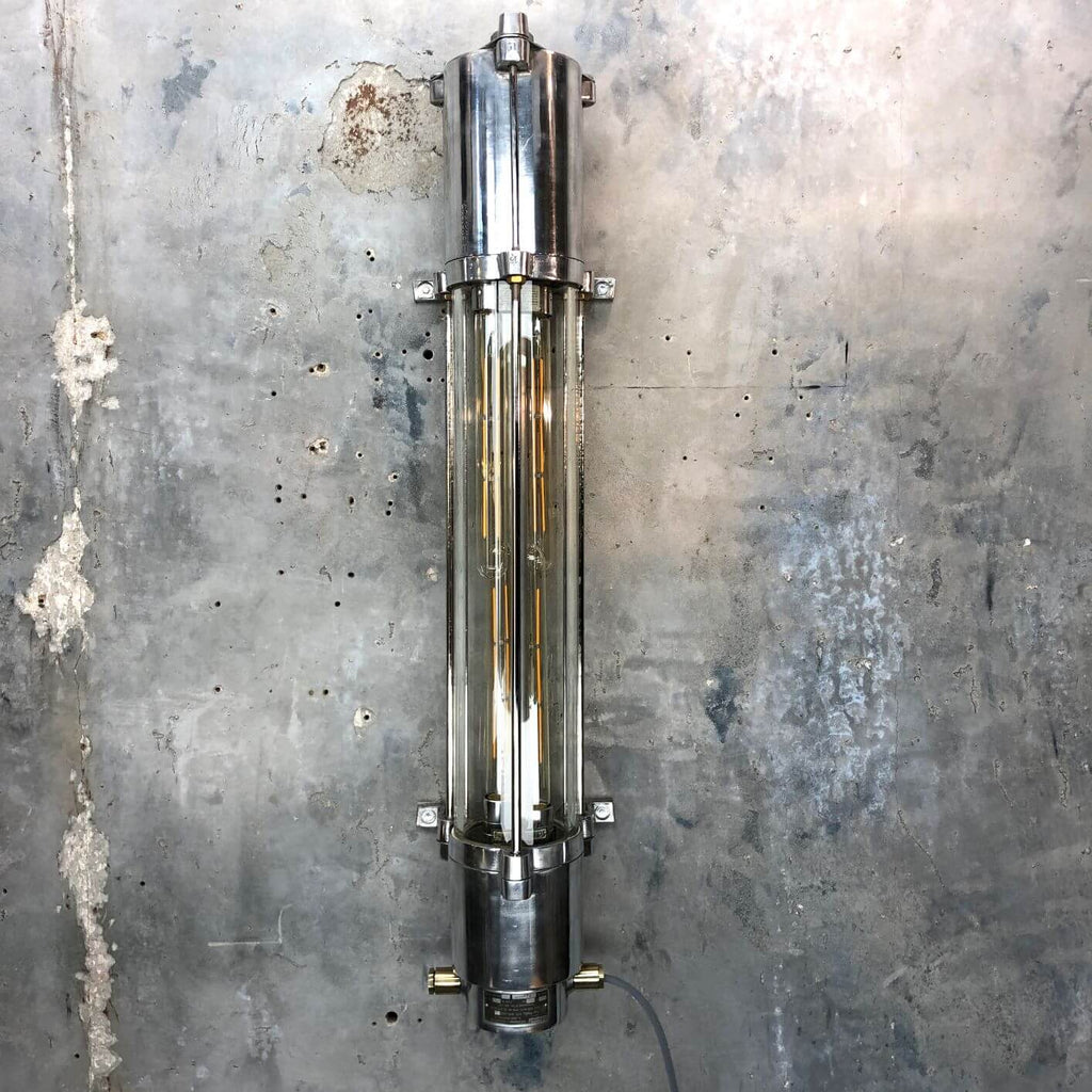 a vintage industrial style aluminium wall mounted flameproof strip light with Edison LED tubes.