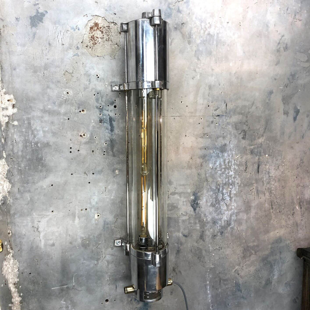 a vintage industrial style aluminium wall mounted flameproof strip light with Edison LED tubes.