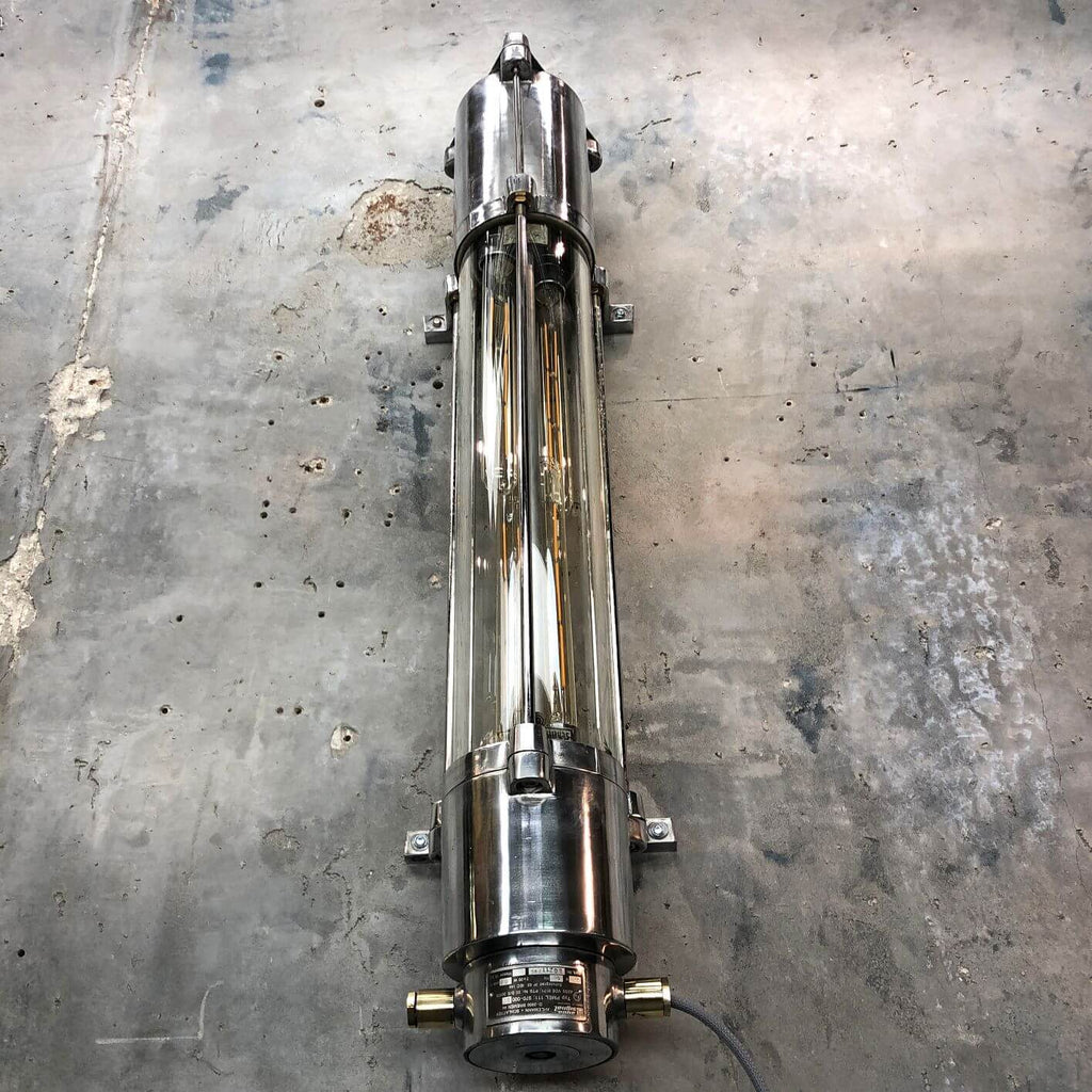 a vintage industrial style aluminium wall mounted flameproof strip light with Edison LED tubes.