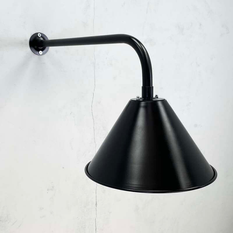 A satin black industrial style wall light made new in 2022 in England by Loomlight. black cantilever industrial style wall lamp, with LED light bulb