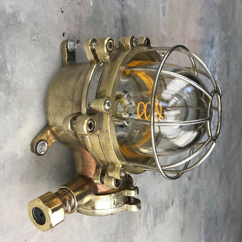 industrial style outdoor cast brass explosion proof bulkhead wall light made c1970. 