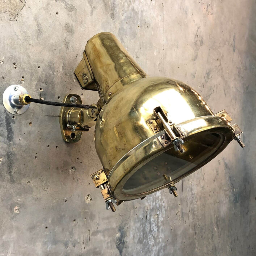A vintage industrial brass directional wall light made in Japan