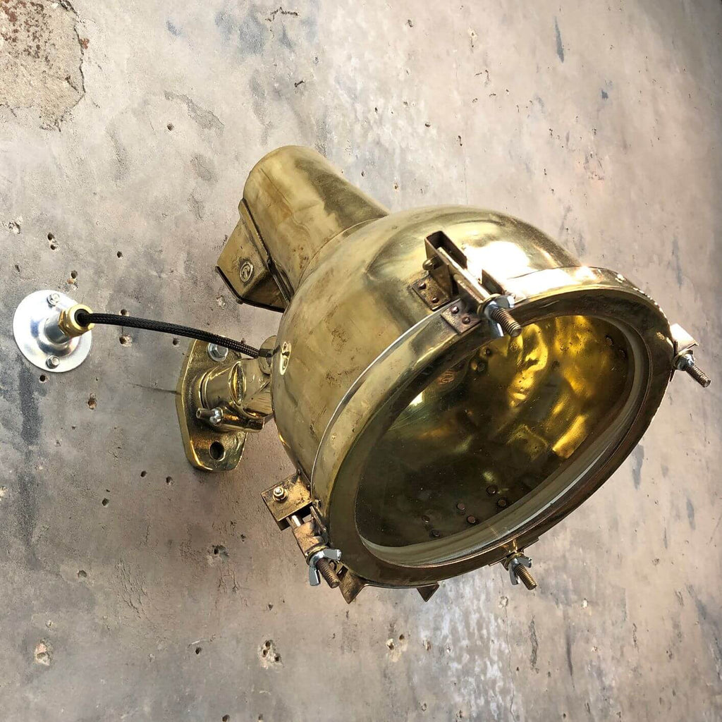 A vintage industrial brass directional wall light made in Japan
