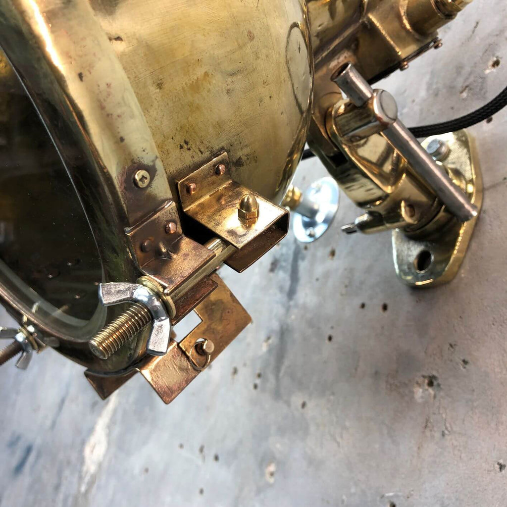 A vintage industrial brass directional wall light made in Japan