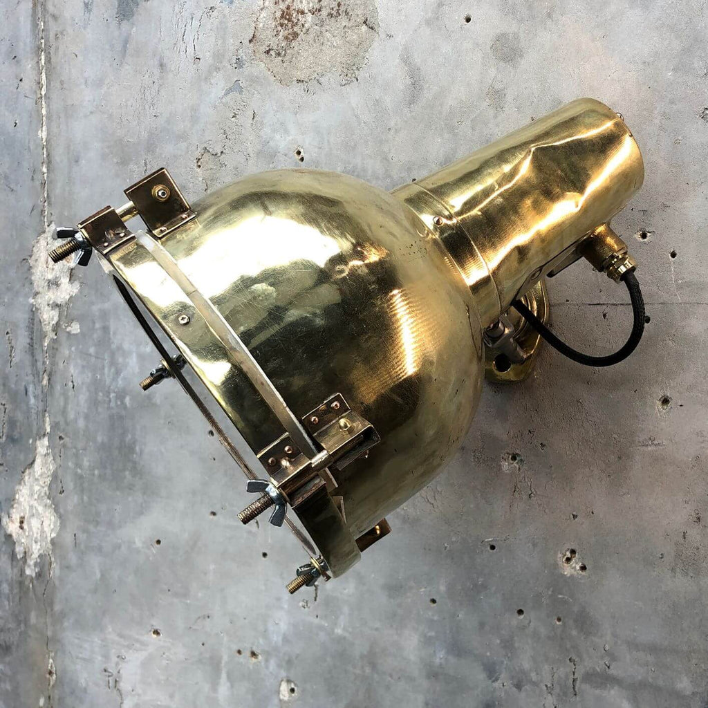 A vintage industrial brass directional wall light made in Japan