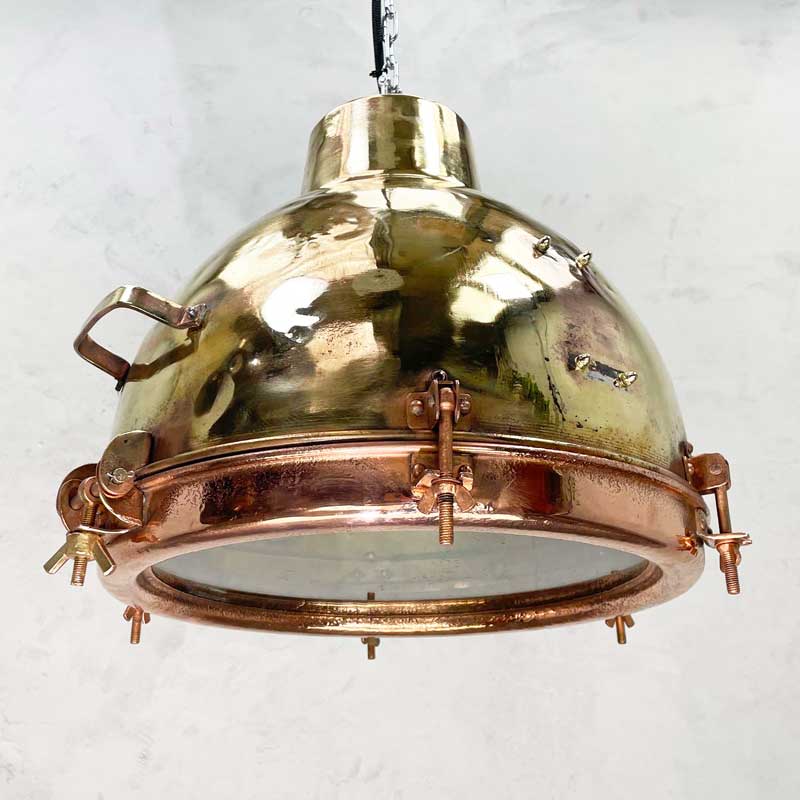 Vintage industrial Brass hanging lights. reclaimed and restored for modern authentic rustic and industrial style interiors. 